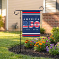 Black metal garden flag stand holding an America 250 flag.