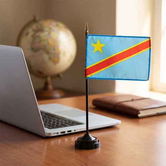 Black desk flag stand with a gold spear topper holding a Congo flag