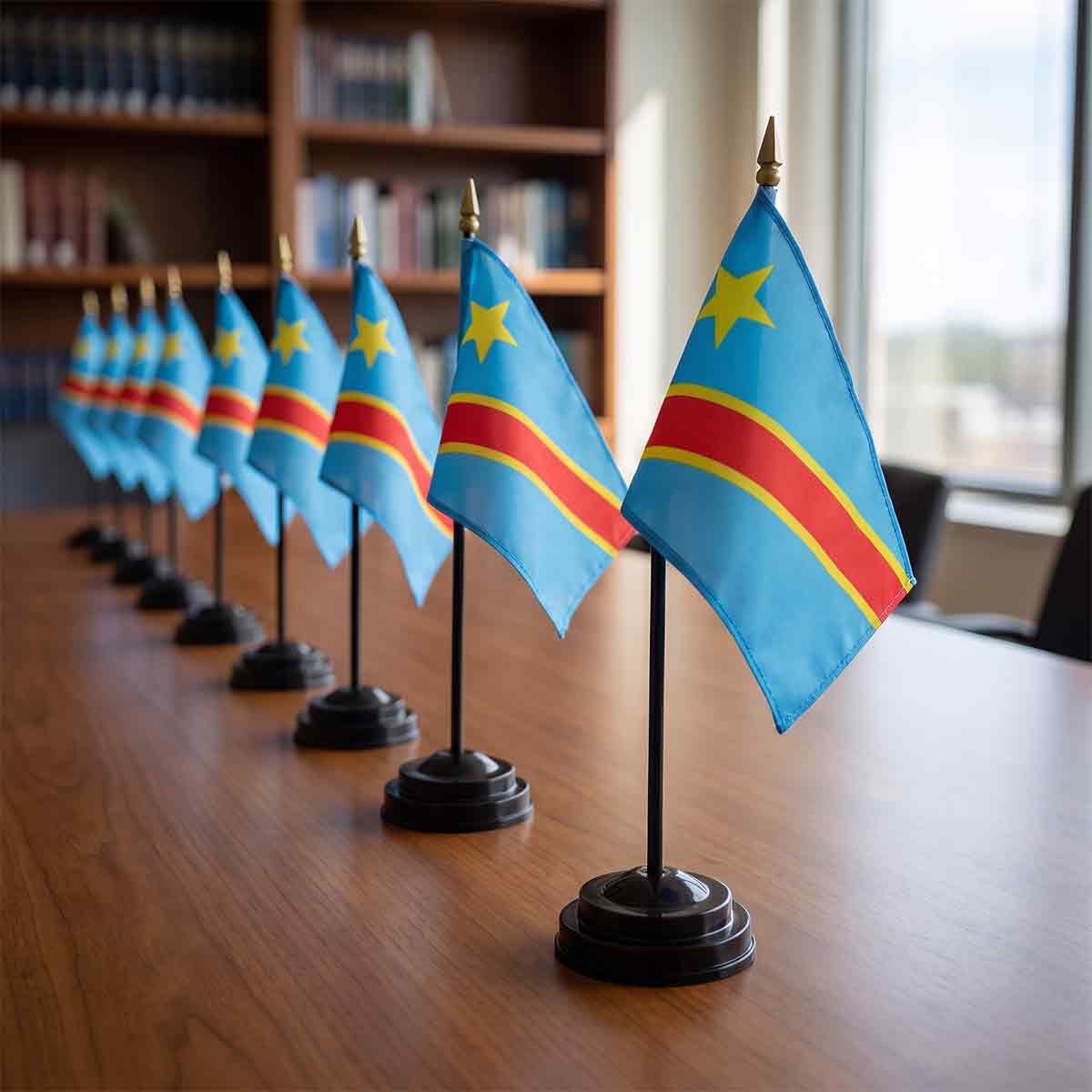 Black desk flag stands with gold spear toppers displaying Congo flags