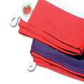 Red and blue fabric with grommets on a white background