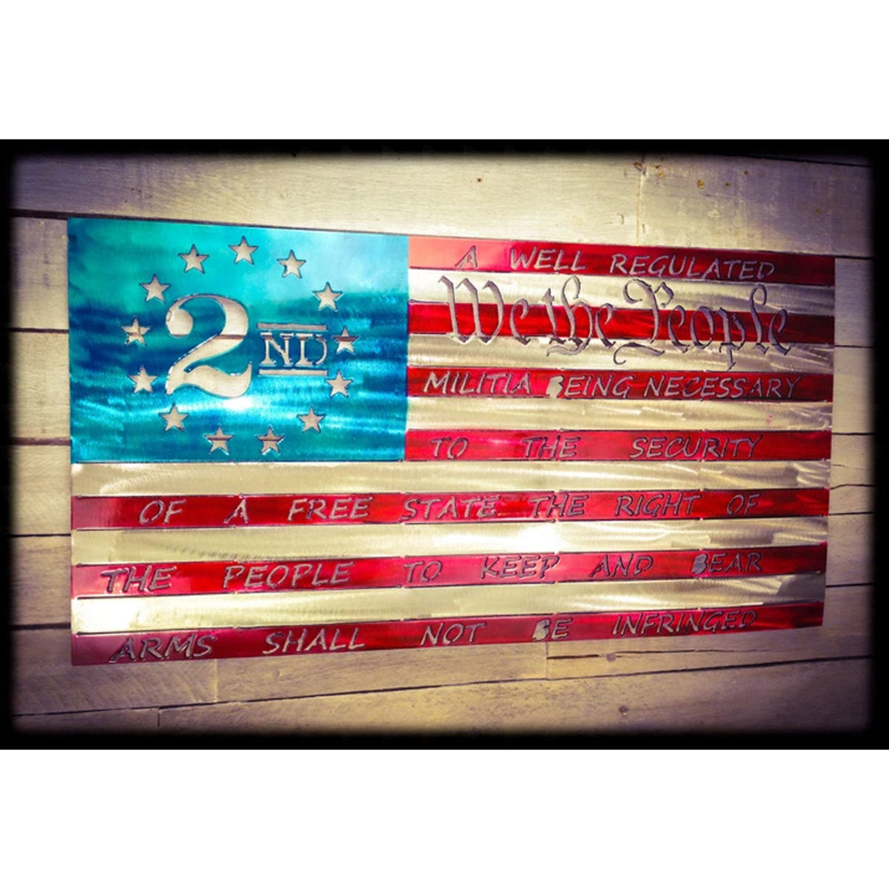 Wooden flag with text and design resembling the Second Amendment on a wooden background