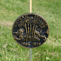 Bronze Vietnam Service medal on a stick with a grassy background