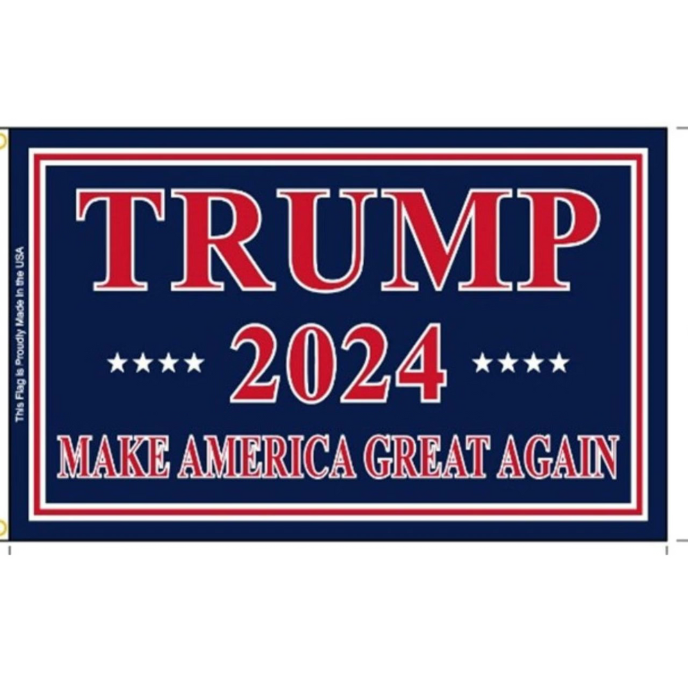 Political campaign banner with 'TRUMP 2024 MAKE AMERICA GREAT AGAIN' text on a blue background.
