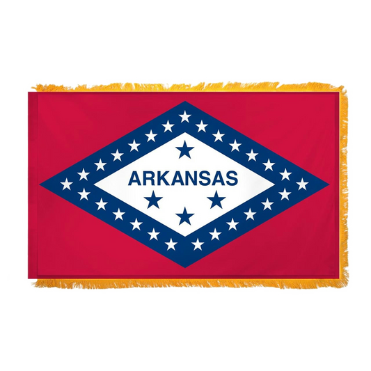 State of Arkansas flag with red background and a large horizontal diamonded outlined in blue with white stars and a white center with four blue stars and "Arkansas" text.  This flag features yellow fringe.