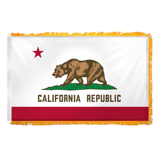 State of California flag featuring a grizzly bear, a red star, and the words 'CALIFORNIA REPUBLIC' on a white background with a red bottom stripe.  Flag has yellow fringe.