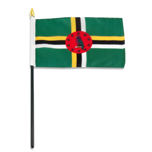 Flag of Dominica with green background, yellow, black, and white stripes featuring a red central emblem with a parrot.