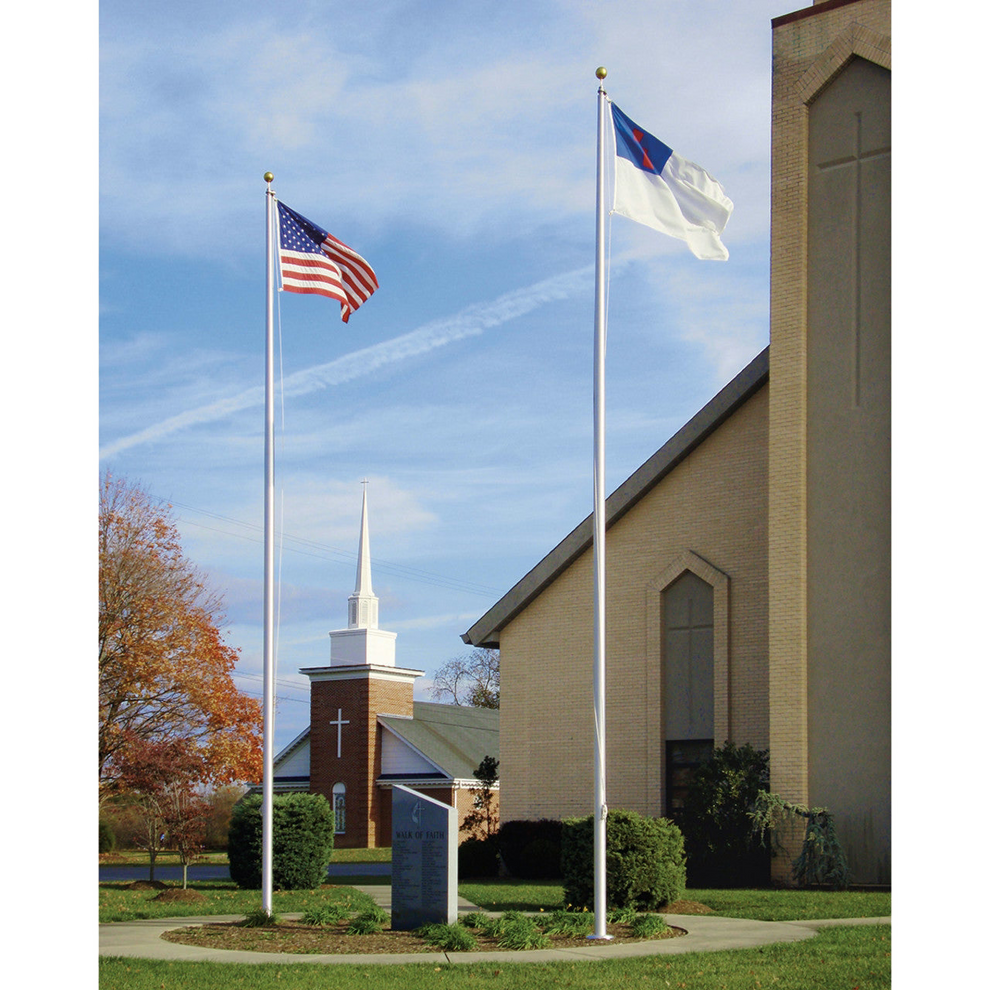 Church with American flag and another flag on a clear day