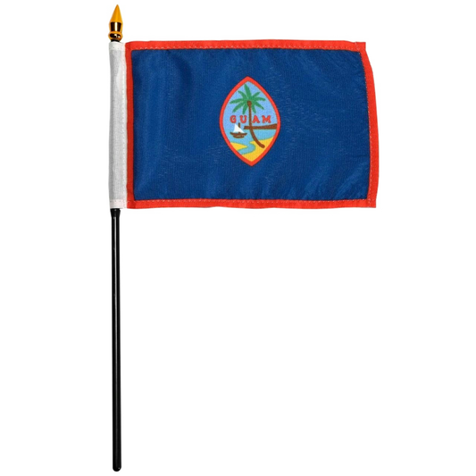 Flag of Guam with a red border on a blue background and an oval center featuring a beach scene with a tree and a sailboat