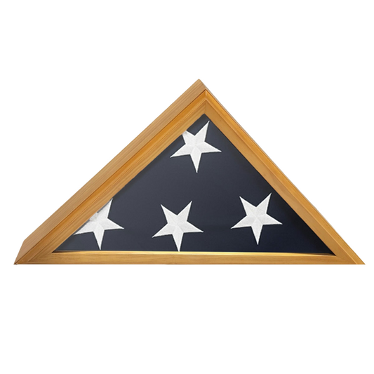 A triangular flag display case with a wooden frame on a white background featuring.  The flag is folded showing four white stars and the blue canton