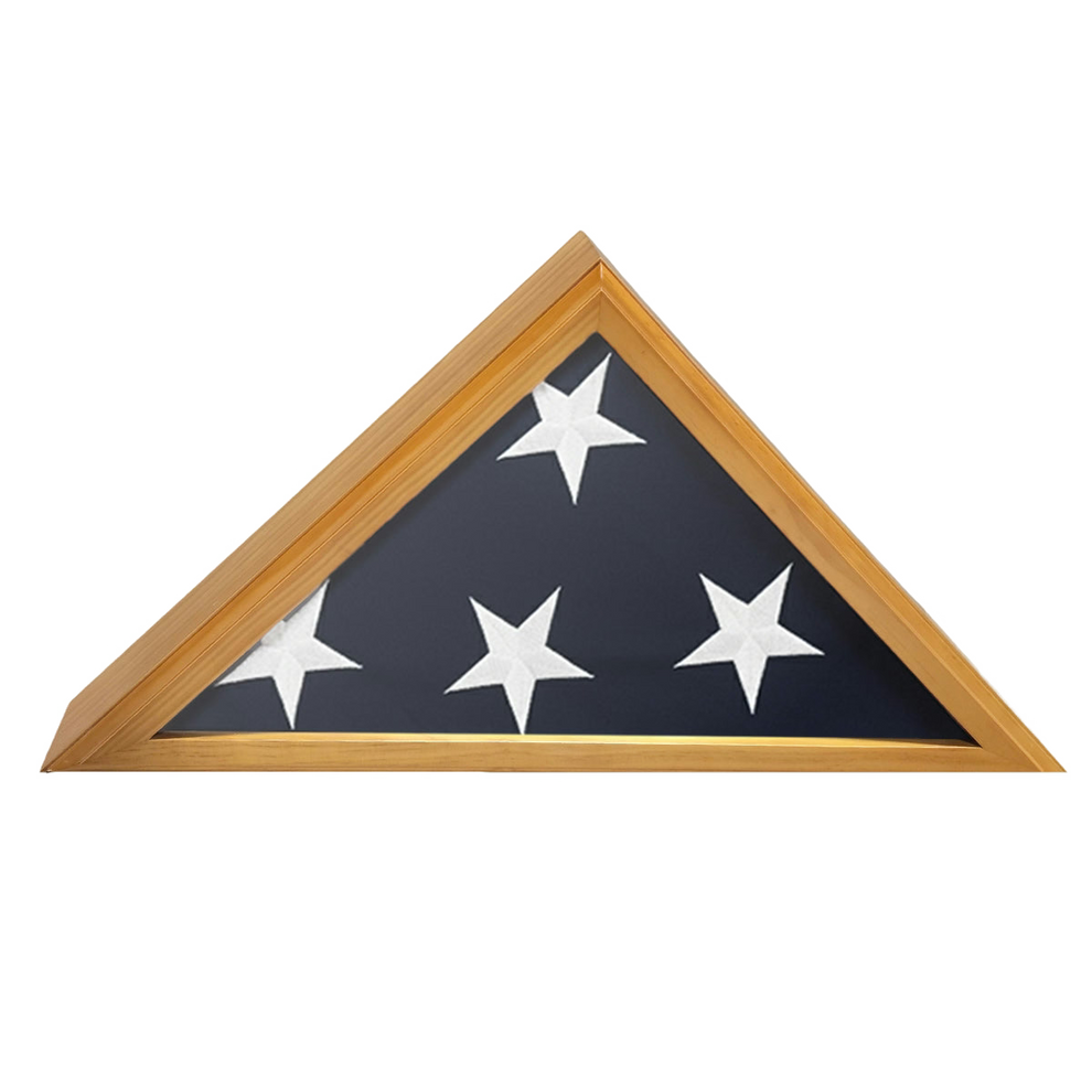 A triangular flag display case with a wooden frame on a white background featuring.  The flag is folded showing four white stars and the blue canton