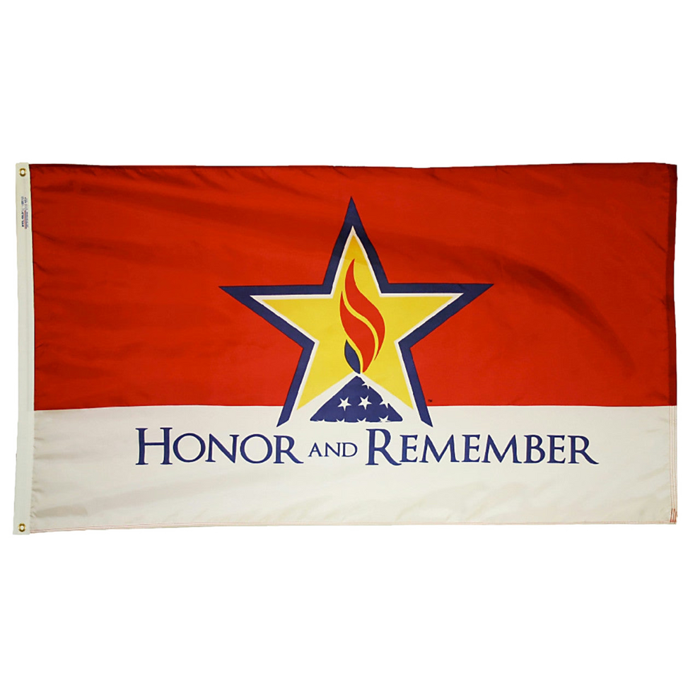 Honor and Remember flag with a red top and white bottom, featuring a central yellow star bordered in blue containing a flame and folded US flag motif above blue "HONOR AND REMEMBER" text.