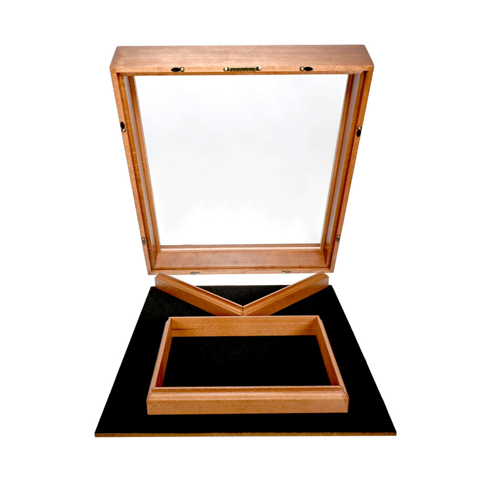 Open wooden shadow box with a glass lid, black felt backing, and display frame components.
