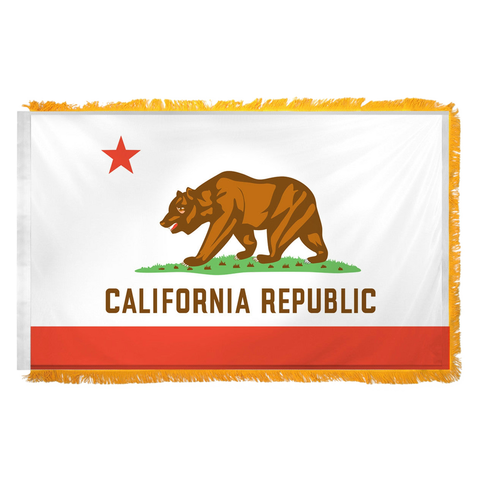 Flag of California with a bear and star design on a white background 