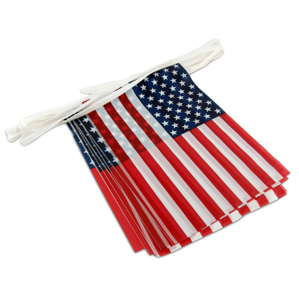 String of small American flags on a white cord.