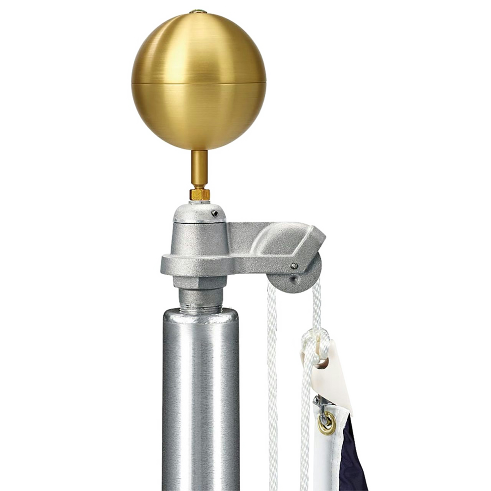 Commercial grade flagpole with a gold-colored ball on top, equipped with a rope system.