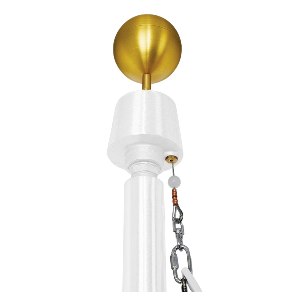 Commercial grade flagpole with a gold-colored ball on top, equipped with a wire cable system.