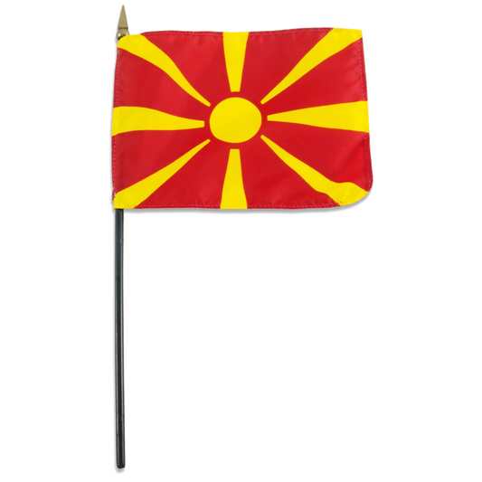 Small Macedonian stick flag with red background and yellow star on a white background