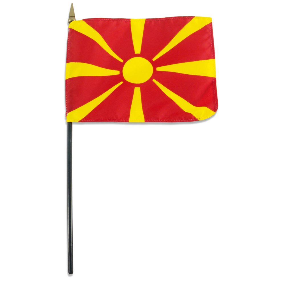 Small Macedonian stick flag with red background and yellow star on a white background