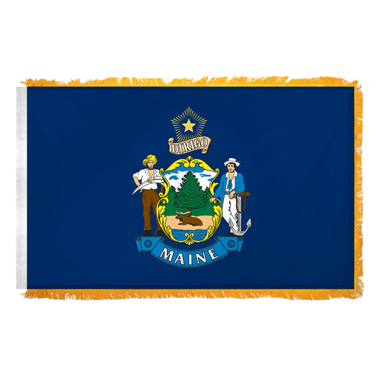 State of Maine blue flag featuring the full-color state seal with a moose, pine tree, farmer, and sailor on a blue field with text 'DIRIGO' and a yellow star.  Flag features yellow fringe.