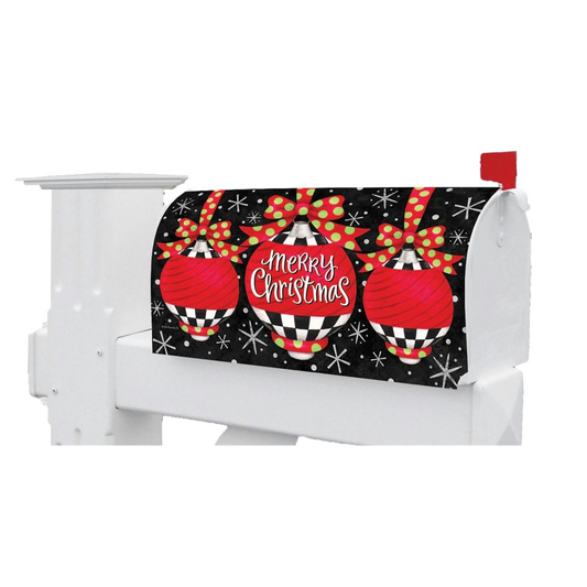 White mailbox with a Christmas-themed cover featuring red ornaments and snowflakes on a black background.