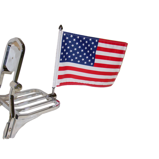 Small American flag mounted on a chrome motorcycle luggage rack.