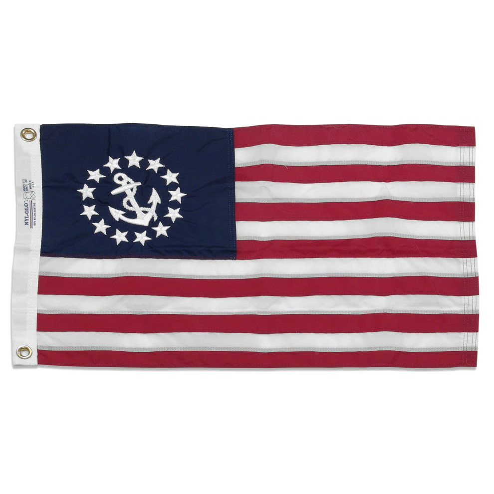 U.S. Yacht Ensign flag with a white anchor and 13 stars in the blue canton, plus red and white stripes.