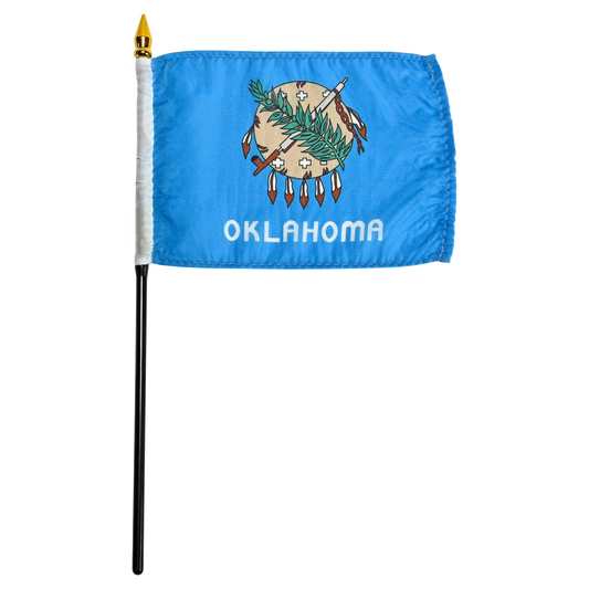 State of Oklahoma small stick flag featuring the traditional buffalo-skin shield, peace pipe, olive branch, and white 'Oklahoma' text on a vibrant sky-blue field.