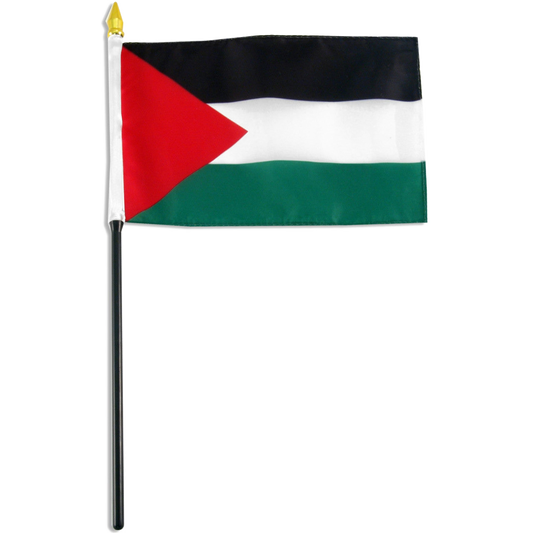 A small Palestinian flag on a black stick with a gold spearhead finial, shown against a plain white background.