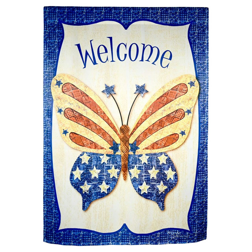 Decorative welcome sign with butterfly design featuring American flag colors on a blue background.