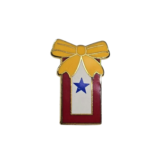 In service pin with a yellow bow, red box, and blue star on a white background