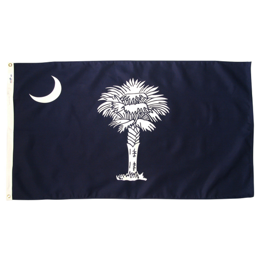 South Carolia state flag with a white palm tree and moon on a blue background