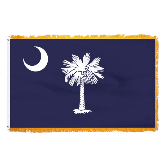 South Carolina state flag with a white palmetto tree and moon on a blue background