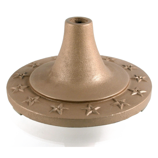 Bronze-colored flagpole base with star patterns on a white background