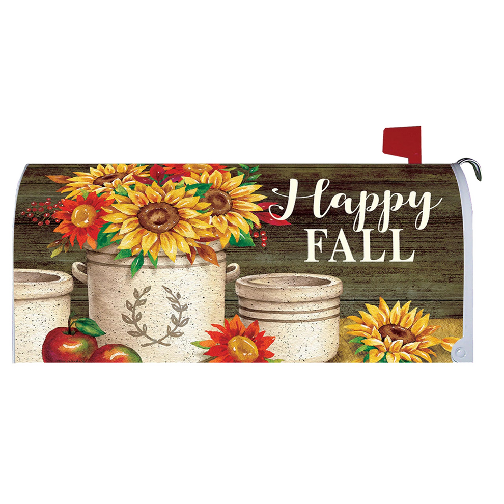 Decorative mailbox cover with sunflowers, apples, and 'Happy Fall' text on a wooden background.