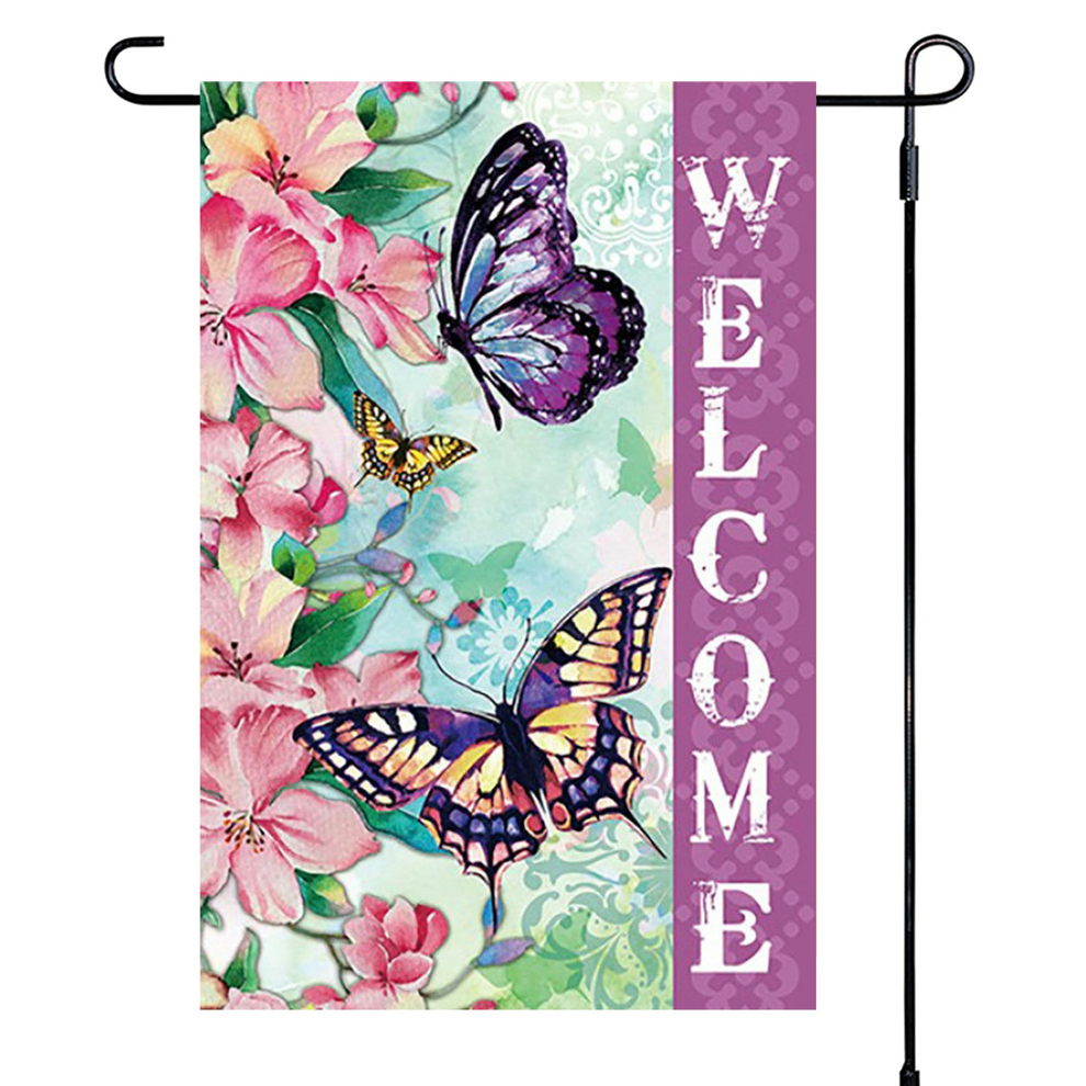 Decorative garden flag with butterflies and flowers featuring the word 'WELCOME'.