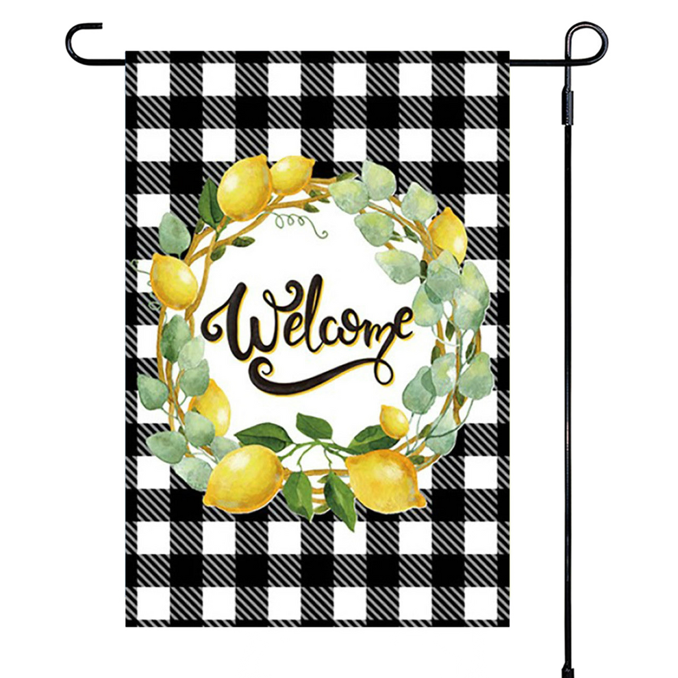 Garden flag with lemon wreath and 'Welcome' text on a black and white checkered background