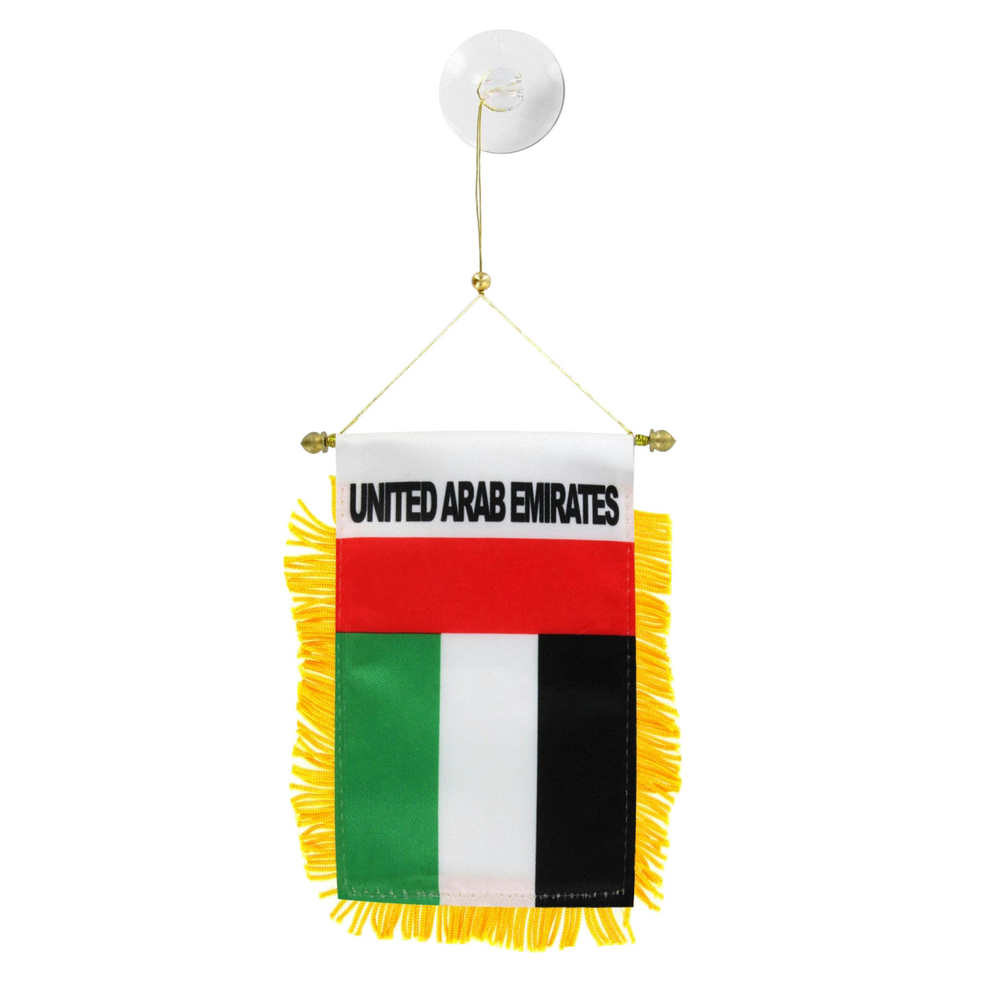 Small flag of the United Arab Emirates with fringes on a white background