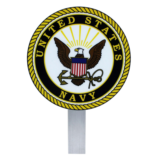 A circular United States Navy emblem grave marker mounted on a silver metal stake, featuring the official Navy seal with an eagle, shield, and anchor on a white background.