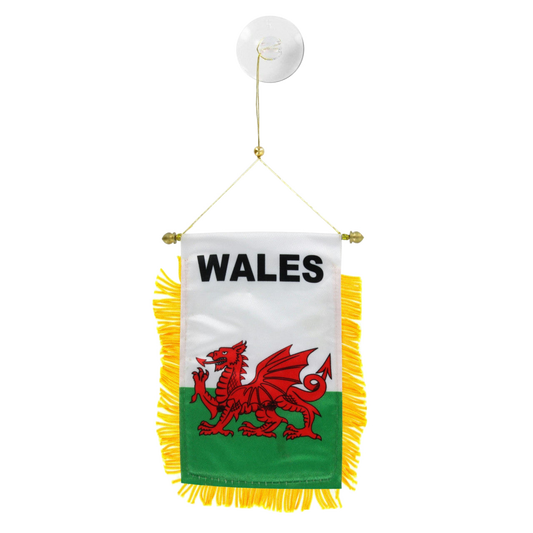 Wales flag with red dragon emblem and yellow fringe on a white background
