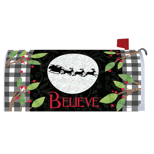 Christmas-themed mailbox cover with reindeer, moon, and 'BELIEVE' text on a checkered background.