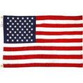 A 5ft x 8ft nylon American flag by Valley Forge with red and white stripes and blue field with white stars.