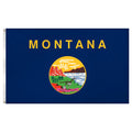 State of Montana flag with 'MONTANA' printed in large, gold all-caps letters across the top. Centered below the text is the full-color state seal, depicting a landscape with the Rocky Mountains, the Great Falls of the Missouri River, a plow, a shovel, and a pick. A ribbon at the bottom of the seal reads the Spanish motto 'ORO Y PLATA'.