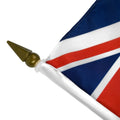 Close up of gold spear on a UK Royal Navy stick flag