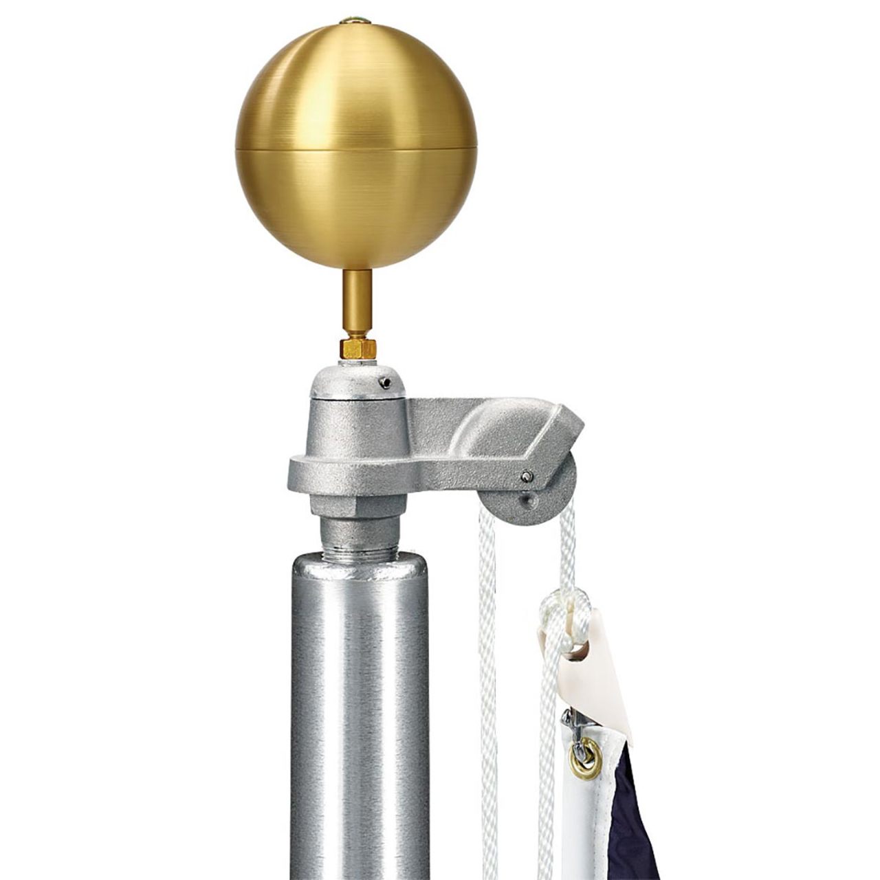 Close up of a gold ball flagpole topper on top of a metal flagpole with a rope pulley system and rope with the top of a flag.