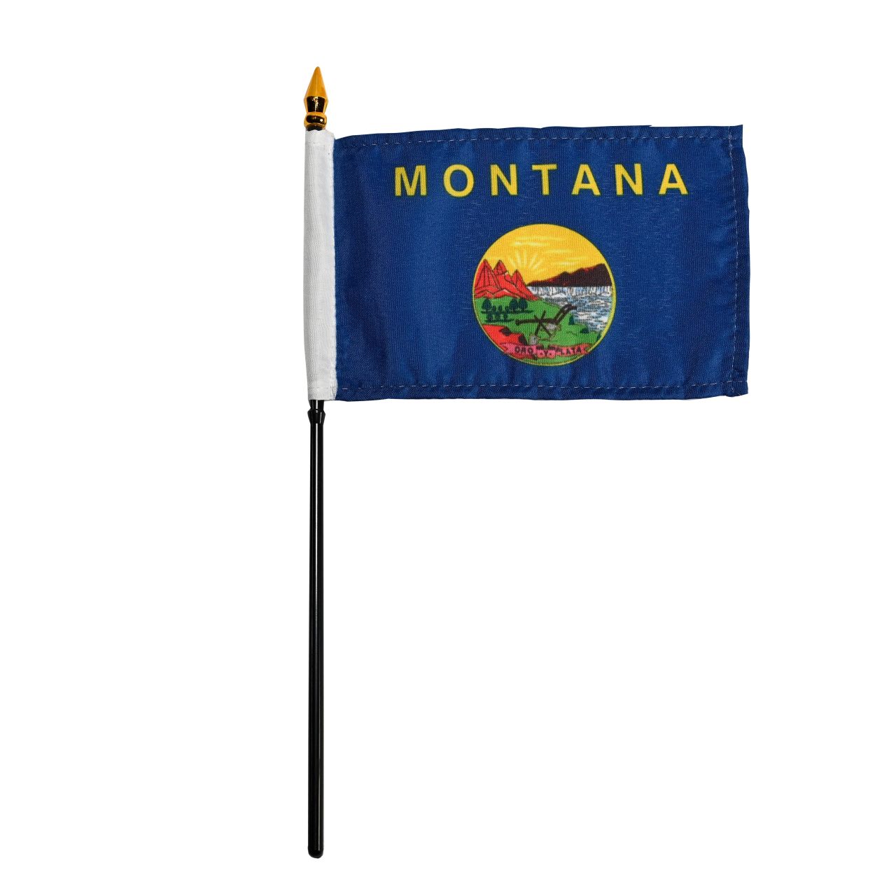 State of Montana stick flag with 'MONTANA' printed in large, gold all-caps letters across the top. Centered below the text is the full-color state seal, depicting a landscape with the Rocky Mountains, the Great Falls of the Missouri River, a plow, a shovel, and a pick. A ribbon at the bottom of the seal reads the Spanish motto 'ORO Y PLATA'.