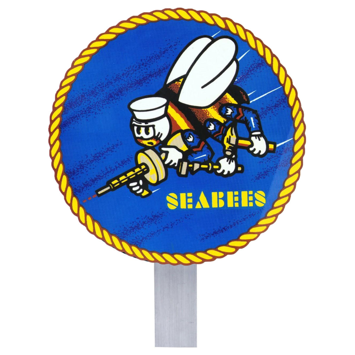 Circular U.S. Navy Seabees grave marker attached to a metal stake, featuring the classic fighting bee logo on a blue background.