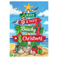 Decorative flag with 'Have a very Beachy Christmas' text on a beach background