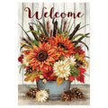 Decorative garden flag with autumn flowers and 'Welcome' text on a wooden background