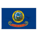 State of Idaho flag featuring the full-color state seal with the text 'ESTO PERPETUA' on a blue background with the 'State of Idaho' red and gold banner.
