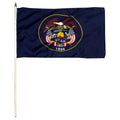 Historical Utah state stick flag design featuring the full-color state seal, gold beehive, and 'Industry' motto on a solid blue background. 